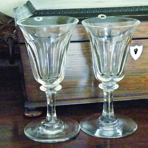 Antique cut crystal wine glasses: Victorian pair; Tariffs paid by us DDP.
