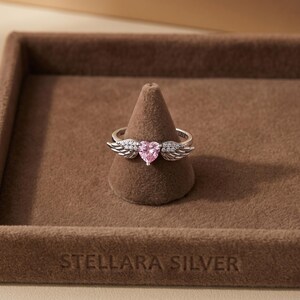 Pink heart ring and clear crystal ring in solid sterling silver with cubic zirconia accents, a cute minimalist ring and dainty heart silver ring designed for stacking and gifting, ideal as a promise ring for her, anniversary ring, or romantic friendship ring for two.