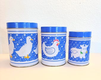 Vintage Farmhouse Canister Set: Blue White Metal Tins with Duck, Chicken, Cow Designs