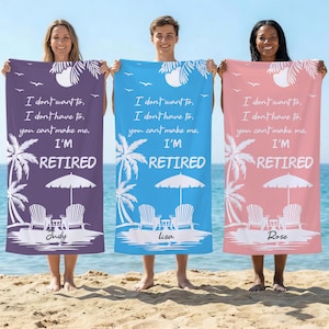 May include: Three beach towels in purple, blue, and pink, each with a beach scene design and the text "I'm Retired." The towels feature palm trees, beach chairs, and an umbrella. Each towel has a different name at the bottom.