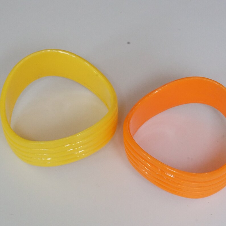 pair of plastic bangles yellow and orange BOHO BANGLES 80s bangles STACKING bangles