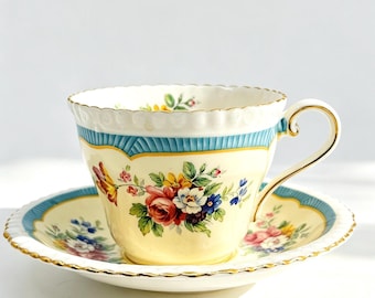 Vintage Aynsley Yellow Floral Turquoise Border Teacup and Saucer