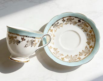 Vintage Royal Albert Bone China Teacup and Saucer, Blue Border, Gold Floral Pattern
