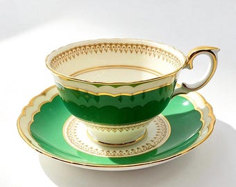Vintage Crown Staffordshire Green & Gold Teacup and Saucer