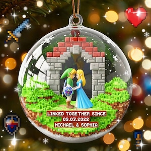 May include: A clear glass spherical ornament containing a miniature scene with two figures standing under a brick archway on a green block landscape. The text reads LINKED TOGETHER SINCE 09.03.2022 MICHAEL & SOPHIA. Pixelated icons of a sword, heart, and shield surround the sphere.