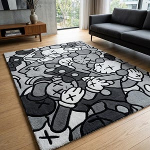 May include: A rectangular rug with a repeating cartoon character pattern in grey, black, and white. The rug has a soft texture and is placed on a wooden floor. The design features crossed-out eyes and gloved hands. The rug measures approximately 200cm x 300cm.
