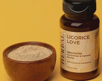 May include: A brown wooden bowl filled with light brown powder sits next to a brown bottle with a black cap. The bottle has a label that reads "LICORICE LOVE" and "UNSCENTED Facial Mask & Cleanser Powder". The bottle contains 2.5 oz (71g) of product.