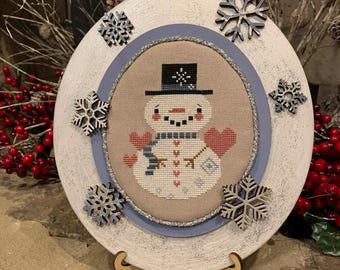 Cadre ovale composé de 3 couches de bois brut