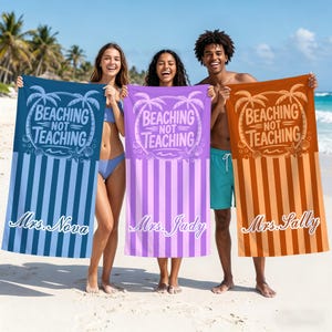May include: Three rectangular beach towels featuring vertical stripes and a circular graphic with palm trees, seashells, and the text "BEACHING NOT TEACHING". Each towel is personalized with a name: "Mrs. Nova" in blue, "Mrs. Judy" in purple, and "Mrs. Sally" in orange.