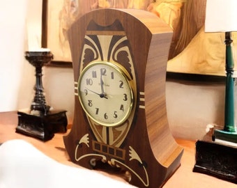 Clock with Art Deco/Nouveau Theme. MC30 Free Shipping within the U.S.