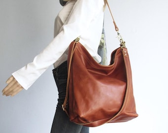 Bruine leren zwerverstas, grote damestas, draagtas met crossbodyriem
