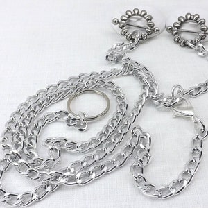 Claw shields with barbells connector chains and chain leash