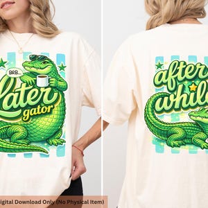 May include: Cream-colored t-shirt featuring a green alligator design with the text "Later Gator" on the front and "After While" on the back. The front design shows an alligator with sunglasses holding a coffee mug. The back design shows an alligator.