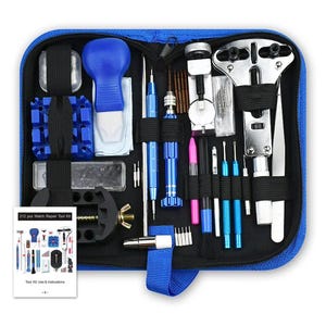 May include: A blue zippered case containing a 212-piece watch repair tool kit. The kit includes various tools like screwdrivers, pliers, and watch case openers. A small instruction booklet is also included.