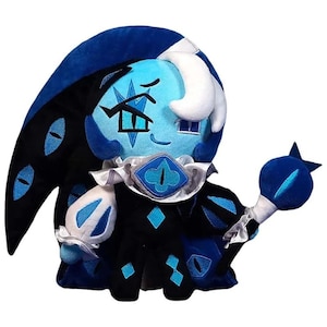May include: A plush doll featuring a blue and black jester-like character. The doll has a light blue face with a stylized eye design, white hair, and a dark blue hat. It wears a black outfit with blue diamond accents and holds a blue orb.