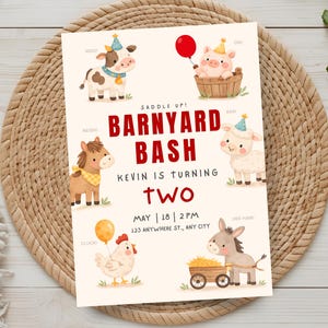 May include: A cream-colored invitation with the text "Barnyard Bash" and illustrations of farm animals. The invitation includes the text "Kevin is turning two" and event details. The invitation is on a woven mat.