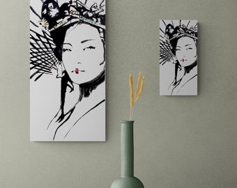 May include: Two black and white illustrations of a woman with a traditional Japanese headdress. The larger illustration is framed and the smaller illustration is unframed. A green vase with a single stem of dried grass is in front of the illustrations.