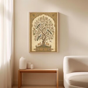 May include: A rectangular wall art print featuring a central tree with intricate branches, foliage, and flowers. Two peacocks are perched on the branches, while two deer stand at the base. The artwork is framed by a decorative gold border.