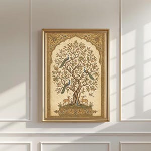 May include: A rectangular wall art print in a gold frame featuring a detailed illustration of a large tree with three peacocks and two deer. The artwork is set against a cream background with an ornate, arched border in shades of gold and brown.