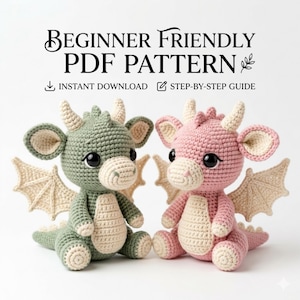 May include: Two crocheted dragon plushies, one sage green and one dusty pink, both featuring cream-coloured horns, wings, and bellies. The text above reads: BEGINNER FRIENDLY PDF PATTERN, INSTANT DOWNLOAD, STEP-BY-STEP GUIDE.