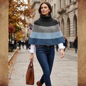 May include: A woman wearing a striped poncho in shades of gray and blue, paired with dark blue jeans and a brown leather tote bag. The poncho has a turtleneck and is worn over a white collared shirt. The woman is walking on a city sidewalk.