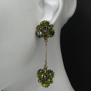 Cluster stick dangle earrings in olive green crystals
