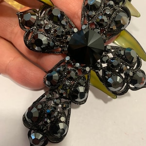 Tear Drop style Crystal Cross Black Plated Made with Hematite  crystals.