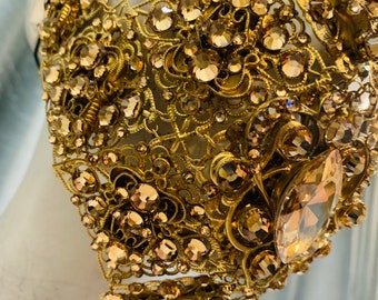 Maschera di cristallo dorato