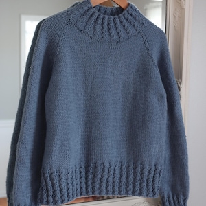 Cable knit sweater pattern, easy raglan sweater knitting pattern. women top down seamless raglan sweater with cables. oversize knit sweater pattern for women. beginner turtleneck pullover sweater knit pattern. high neck jumper knit pattern mock neck. Worsted weight raglan sweater knitting pattern, seamless top-down cable knit pullover PDF
