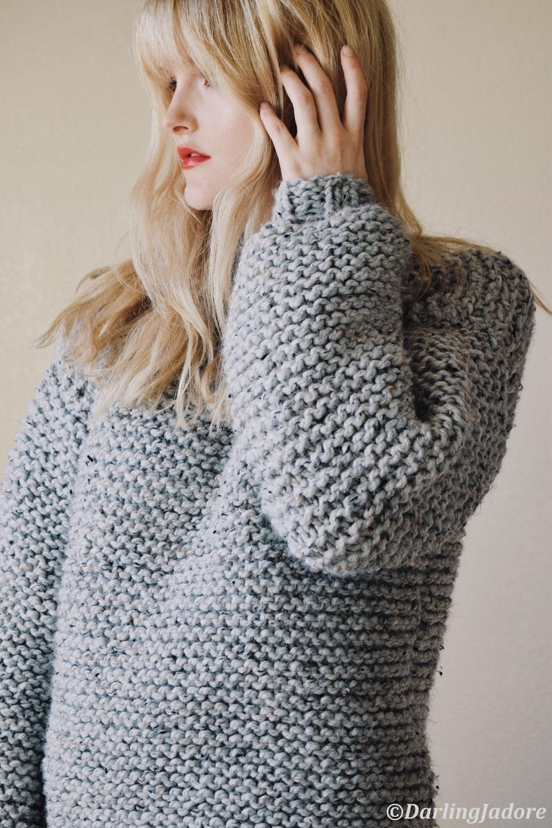 Front view of chunky knit turtleneck sweater in bulky yarn, cozy oversized pullover knitting pattern