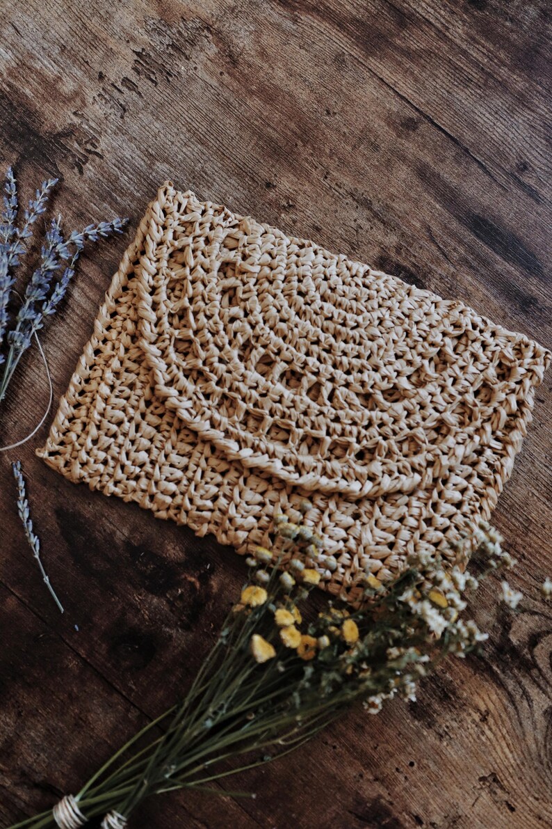 Raffia clutch crochet pattern, straw bag crochet pattern. crochet straw purse pattern. crochet raffia purse tote pattern. easy crochet purse. crochet tote handbag. straw summer bag crochet pattern. beginner crochet bag pattern.  Sunrise Clutch Crochet Pattern, Raffia Clutch Bag Crochet Pattern, Straw Summer Bag Crochet Pattern, Bag Crochet Pattern, Raffia Clutch Crochet Pattern, Summer Bag Crochet Pattern, Easy Crochet Patterns, Beginner Crochet Pattern, Tote Crochet Pattern