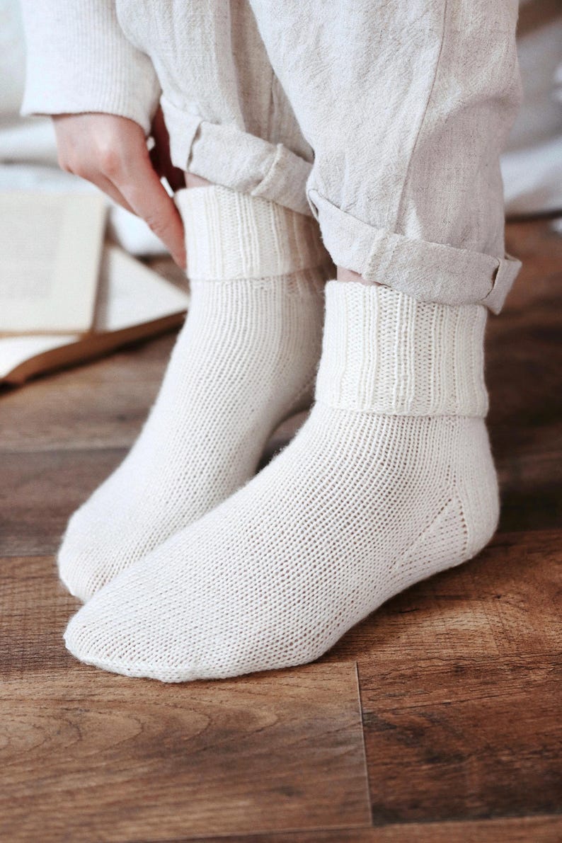 basic socks knitting pattern. fold over socks knit pattern. easy knit women socks. top down knit socks pattern. cream white knit socks pattern. beginner socks knitting pattern. adult women knit socks pattern. classic knit socks.
