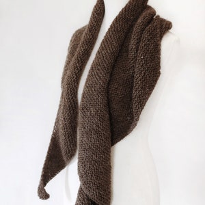 Beginner scarf knitting pattern, easy classic women's knit scarf in worsted weight yarn. Boomerang knit scarf pattern. simple beginner knit wrap PDF instant download. Beginner scarf shawl knitting pattern by Darling Jadore. it's a boomerang asymmetrical shawl knitting pattern designed for beginners.