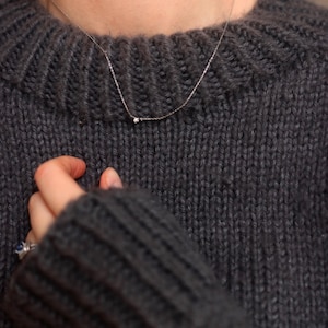 Women's cropped crewneck raglan sweater knitting pattern, oversized seamless top-down pullover in worsted weight yarn, beginner knit jumper PDF instant download. easy knit sweater pattern, beginner knit raglan sweater.