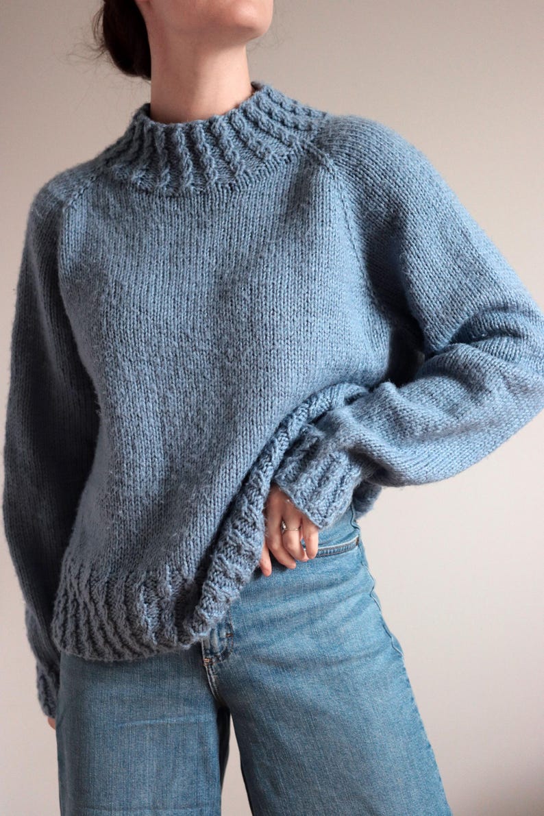 Cable knit sweater pattern, easy raglan sweater knitting pattern. women top down seamless raglan sweater with cables. oversize knit sweater pattern for women. beginner turtleneck pullover sweater knit pattern. high neck jumper knit pattern mock neck.
