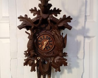 Fully Serviced Antique 1 Day Black Forest Musical Hunter Themed Cuckoo Clock, Stag Deer Head, Dead Animals Rifle, new Bellow tops, Runs Well