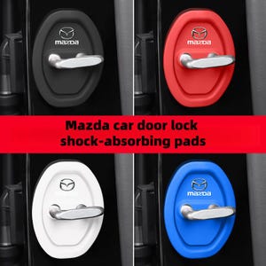 Puede incluir: Cuatro almohadillas amortiguadoras para cerraduras de puertas de coche en negro, rojo, blanco y azul. Cada almohadilla tiene un tirador plateado y un logotipo de Mazda. Las almohadillas tienen forma ovalada.