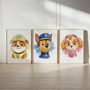 May include: Three framed watercolor prints featuring cartoon dog characters. Each dog is depicted in a different outfit: a construction worker, a police officer, and a pilot. The artwork has a soft, colorful aesthetic with a white background.