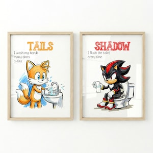 May include: Two framed prints featuring cartoon characters. One shows Tails washing hands, the text reads "TAILS I wash my hands many times a day." The other shows Shadow on a toilet, with text "SHADOW I flush the toilet every time."