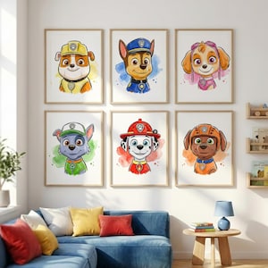 May include: Six framed watercolor prints featuring cartoon dog characters in various uniforms. Each portrait has a watercolor background and is set against a white background. The prints are displayed on a white wall above a blue sofa.