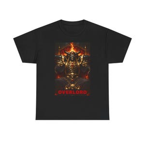 May include: Black t-shirt featuring a detailed graphic of a skeletal figure in ornate armor, seated on a throne with flames in the background. The word "OVERLORD" is printed in red at the bottom of the design.
