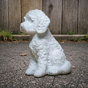 May include: A set of three ceramic mugs with a speckled, matte finish. The mugs are in shades of cream, light gray, and dark gray. Each mug has a simple, minimalist design, perfect for coffee or tea.