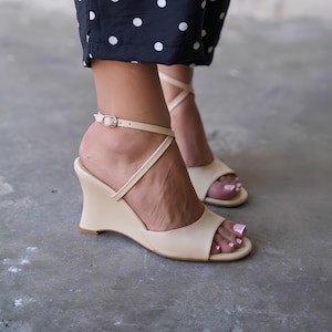 champagne wedge dress shoes Women's Champagne Pearl Embellished Wedge Sandals - Elegant Strappy Low Heel Dress Shoes for Resort Evenings, Comfortable Glamorous Footwear for Summer Vacation & Cruise Parties 2026