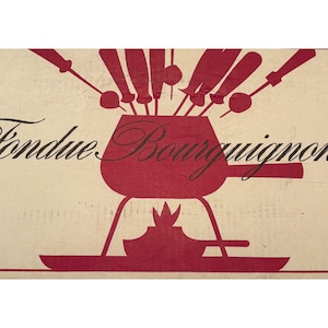 May include: A vintage-style illustration featuring a red fondue pot with skewers, a flame, and the words "Fondue Bourguignon" in elegant script. The design is set against a cream-colored background, evoking a retro aesthetic.