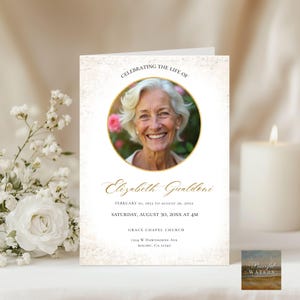 May include: A memorial card featuring a photograph of a smiling woman in a gold frame. The card includes gold text with the words "Celebrating the Life of Elizabeth Gualdoni" and details of her life and memorial service.