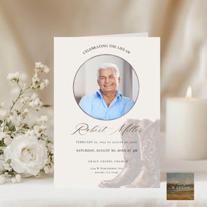 May include: A memorial card with a photo of a smiling man in a blue shirt, framed by text that reads "Celebrating the Life of Robert Miller." Includes dates, time, and location details, with a faded image of cowboy boots.