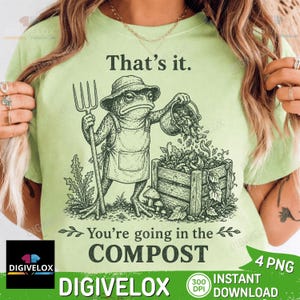 May include: Light green t-shirt featuring a cartoon frog in a gardening apron, holding a pitchfork and pouring compost into a wooden bin. Text reads "That's it. You're going in the COMPOST."