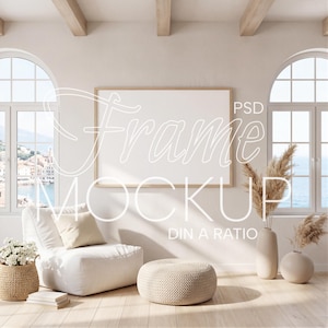 May include: A bright, airy interior with a large, blank rectangular frame, perfect for displaying art or photos. The room features a white beanbag chair, a woven ottoman, and decorative vases with dried plants. The text "Frame Mockup" is overlaid on the image.