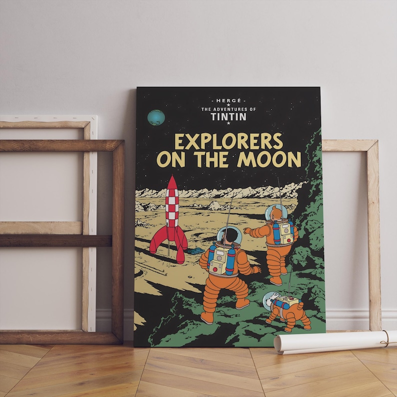 May include: A canvas print of the comic book cover "Explorers on the Moon" featuring astronauts in orange suits, a red and white rocket, and the text "EXPLORERS ON THE MOON" on a black background. The artwork is by Hergé.