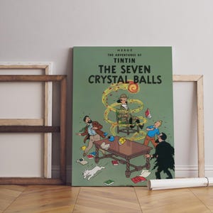 May include: A canvas print of "The Adventures of Tintin: The Seven Crystal Balls" comic book cover. The artwork features a green background with illustrations of characters, a table, and a white dog. The title is in large white letters.